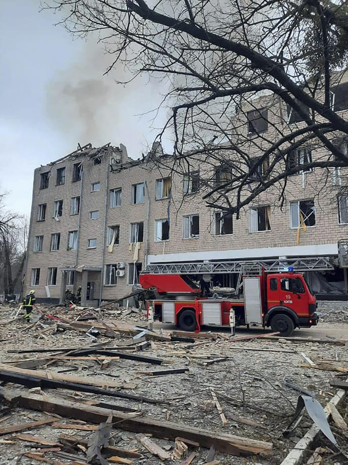 Aftermath of explosion in Kiev as Russian troops enter Ukraine